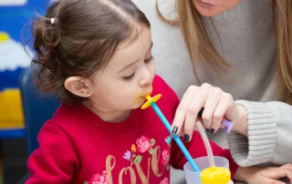 child demonstrating lip closure